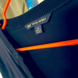 Worn twice. V neck with v sleeve slits. navy Blue.